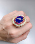 19.61 carat Tanzanite Ring with Ruby and Diamond Halo - Gold Statement Ring