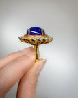 19.61 carat Tanzanite Ring with Ruby and Diamond Halo - Gold Statement Ring
