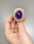 19.61 carat Tanzanite Ring with Ruby and Diamond Halo - Gold Statement Ring