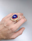 19.61 carat Tanzanite Ring with Ruby and Diamond Halo - Gold Statement Ring