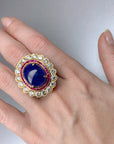 19.61 carat Tanzanite Ring with Ruby and Diamond Halo - Gold Statement Ring