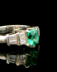 Platinum Ring with 0.55ct Emerald and 0.38ct Diamond
