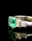 Platinum Ring with 0.55ct Emerald and 0.38ct Diamond