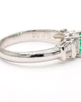 Platinum Ring with 0.55ct Emerald and 0.38ct Diamond