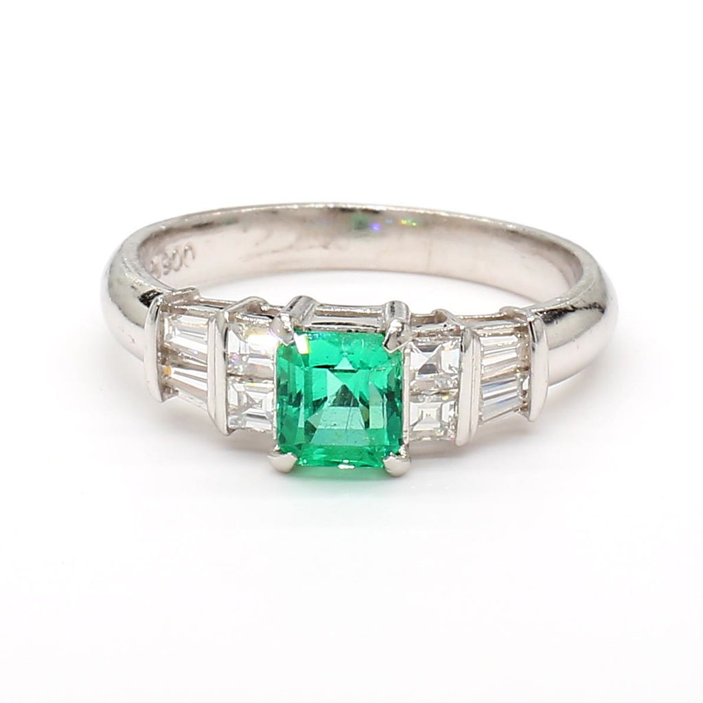 Platinum Ring with 0.55ct Emerald and 0.38ct Diamond