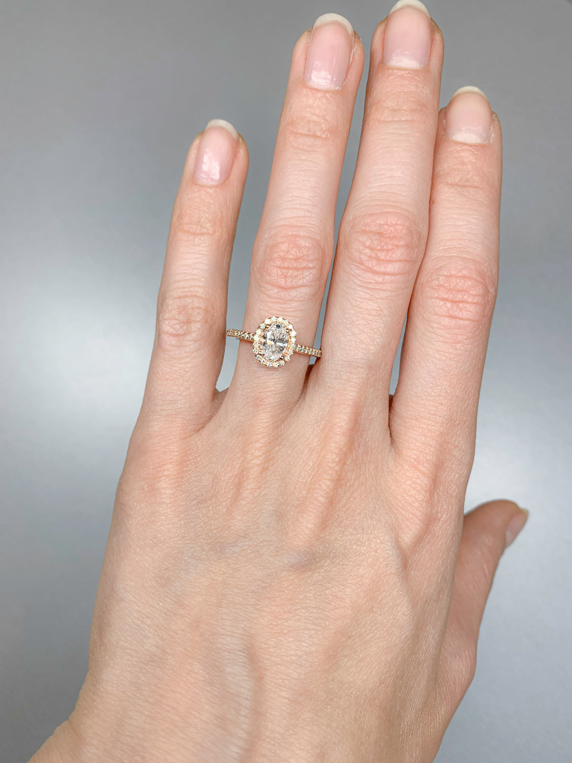 1.2 Carat Oval Diamond Halo Ring Set in Rose Gold