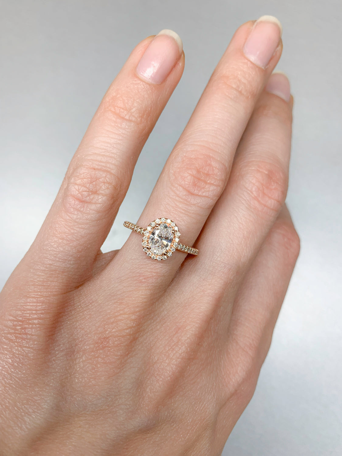 1.2 Carat Oval Diamond Halo Ring Set in Rose Gold