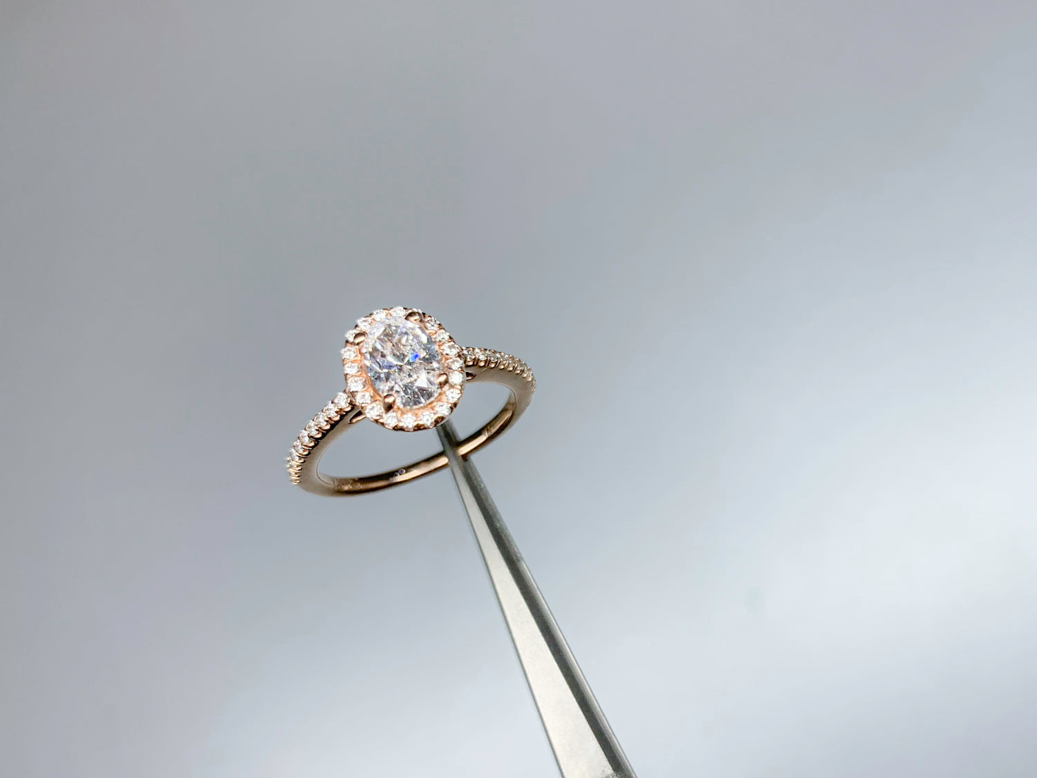 1.2 Carat Oval Diamond Halo Ring Set in Rose Gold